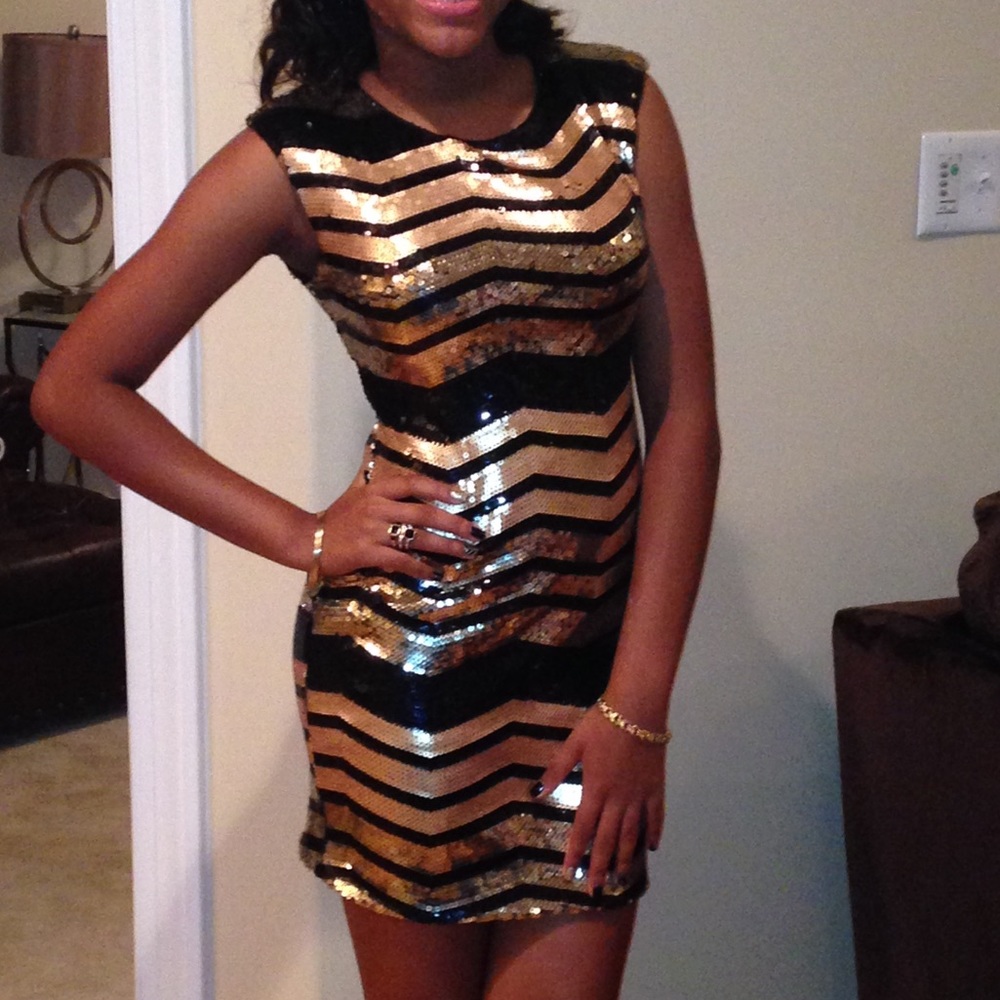 Chevron gold and black sequin mini dress.
